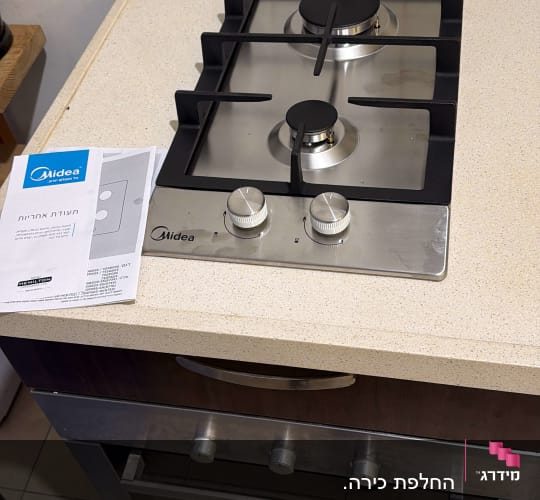 כיריים גז עם חוברת הוראות על השיש